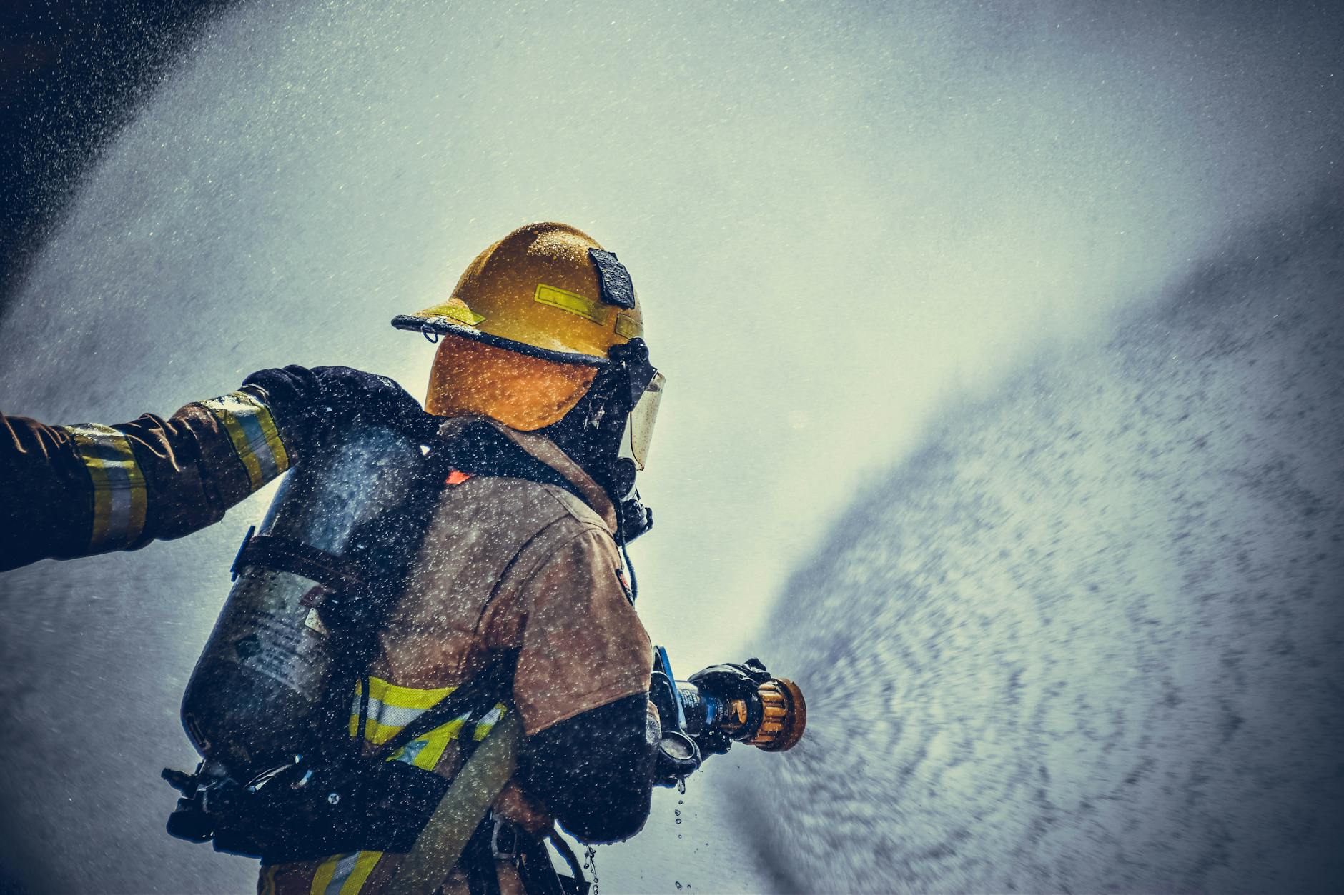 fireman holding fire hose
