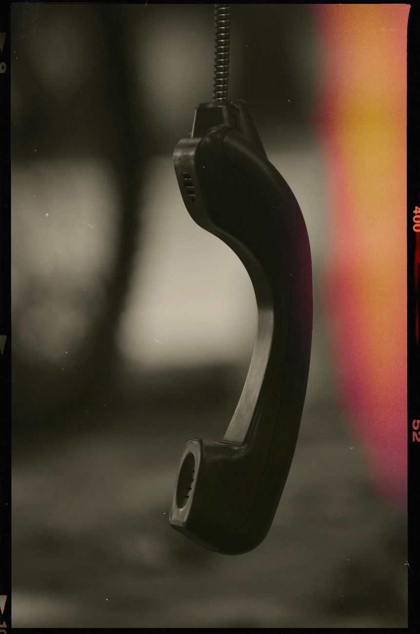 close up of a hanging vintage phone receiver